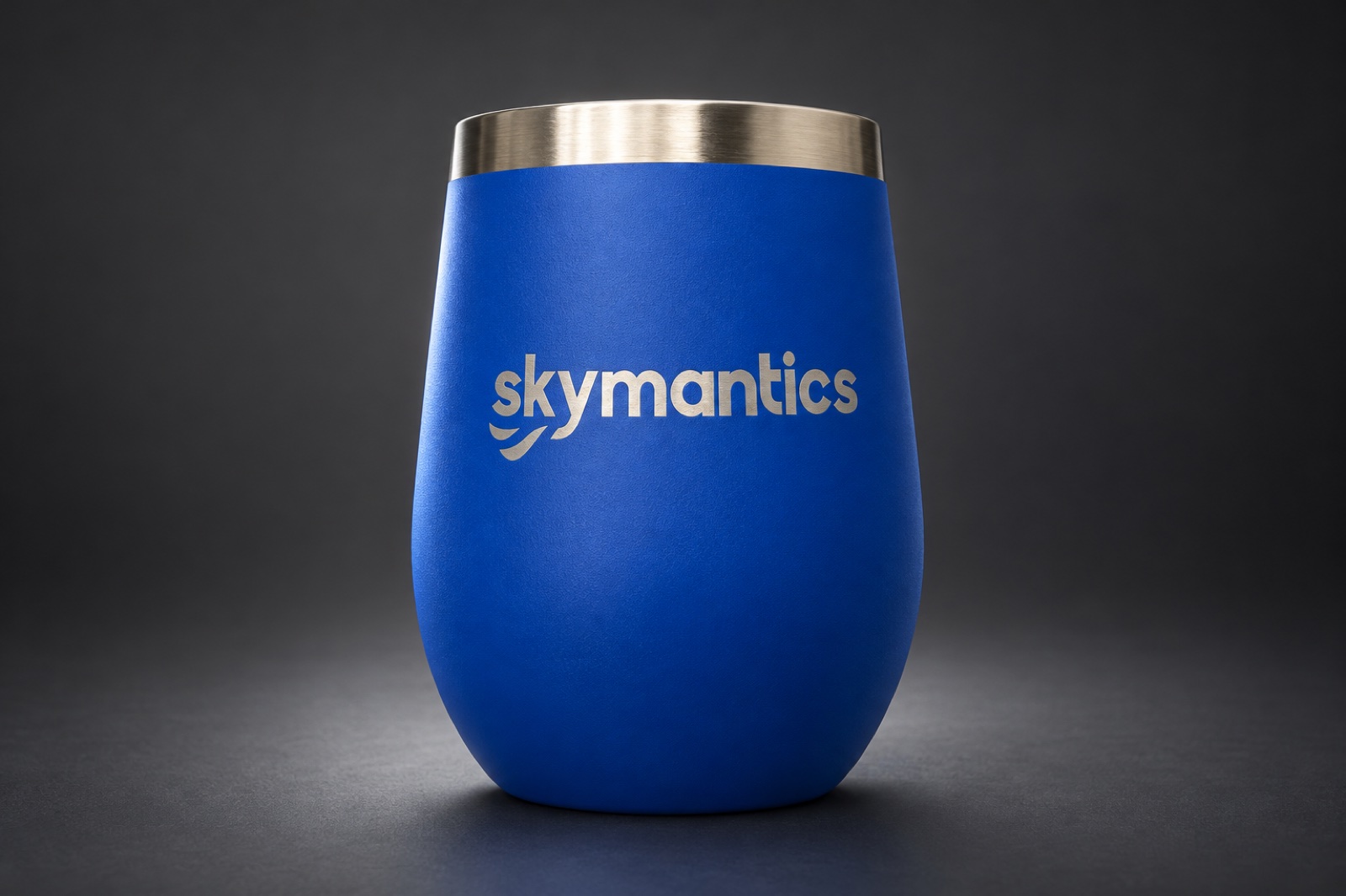 Blue tumbler with a laser-engraved company logo