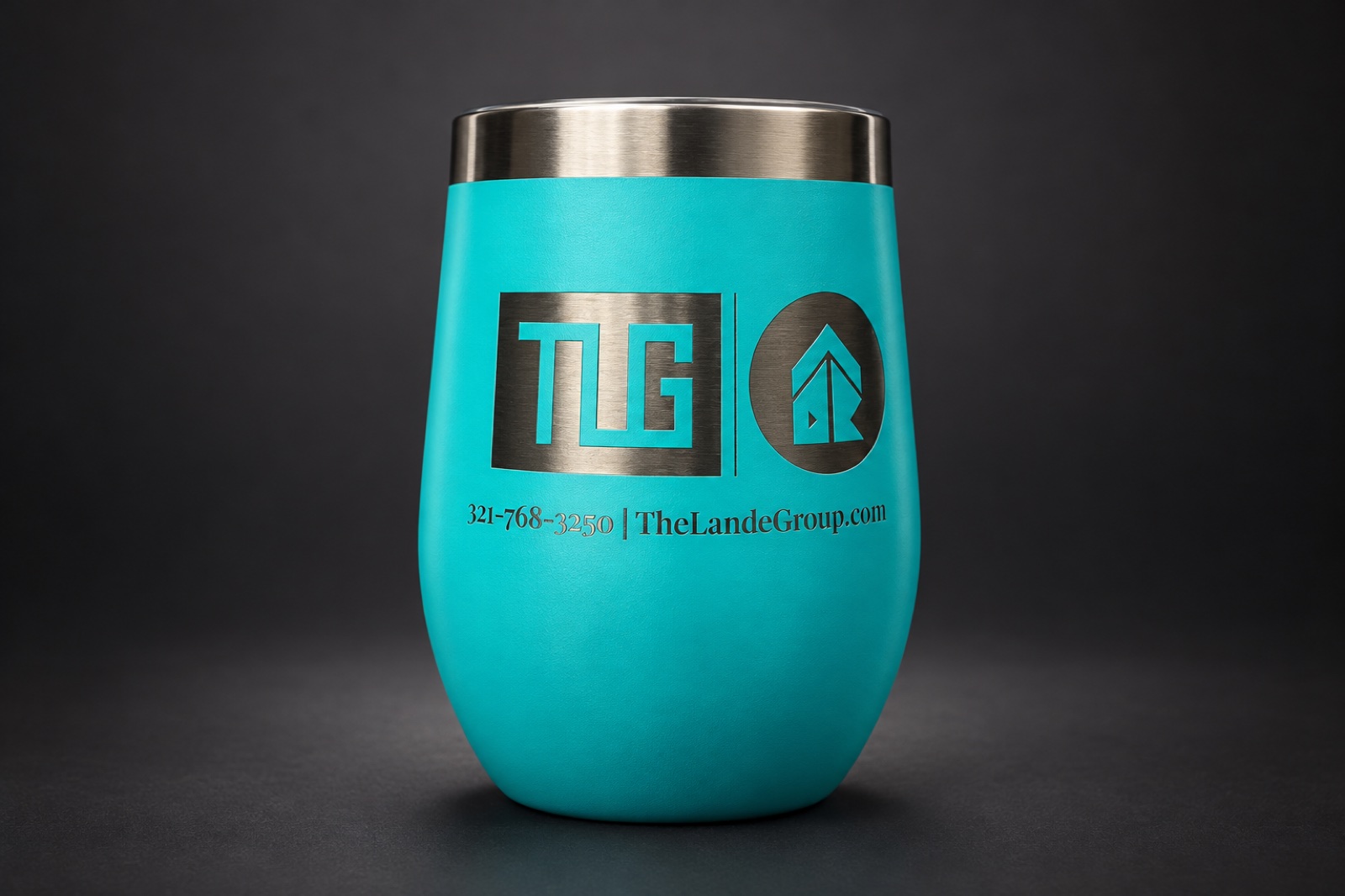 Teal tumbler with detailed laser engraving